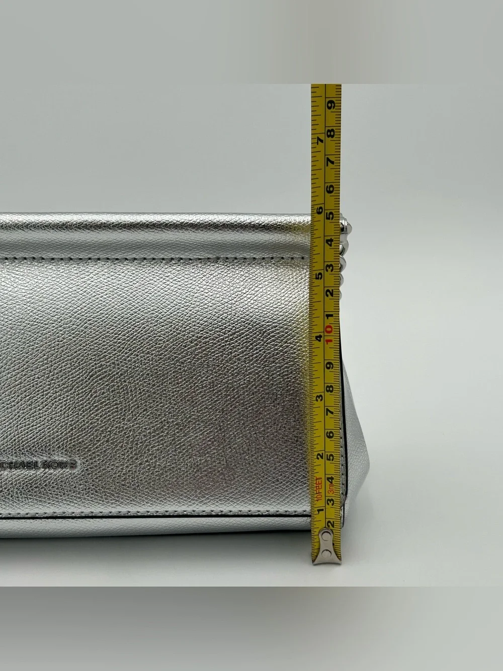 Michael Kors Carmine Silver Metallic Pebbled Leather Pochette